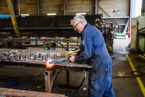 Vakman aan het werk tijdens bouwproject